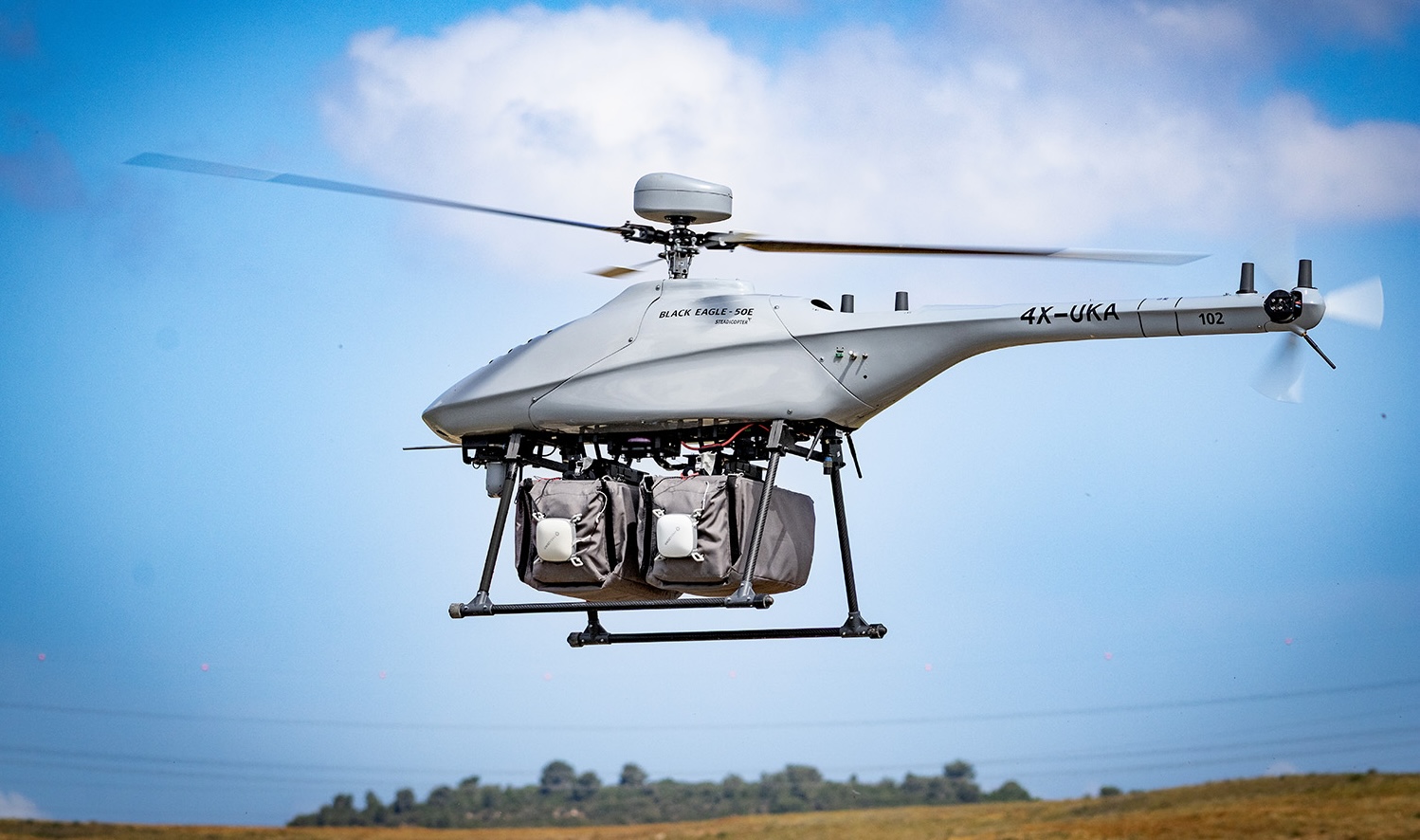 Integration des Präzisionsabwurfsystems DropAir in den vollelektrischen unbemannten Hubschrauber Black Eagle 50E von Steadicopter.