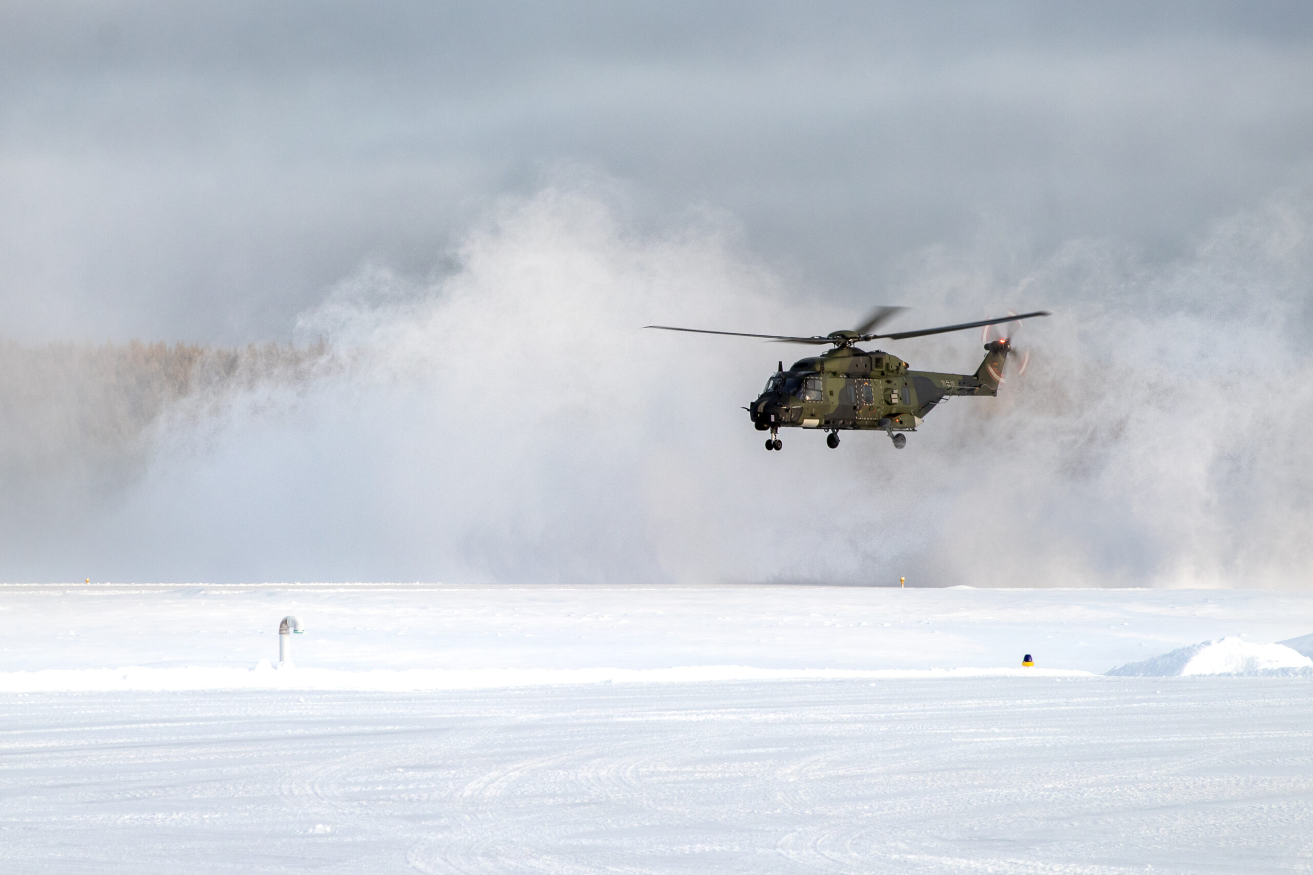 Forschung: Mehrzweckhubschrauber NH-90 landet nach Testflügen auf der Testrange in Vidsel/Schweden im Rahmen der Kälteerprobung Artic Trial. Foto: Bundeswehr / Marco Dorow